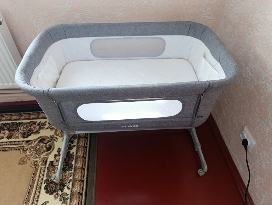 Приставне ліжечко Moweo.