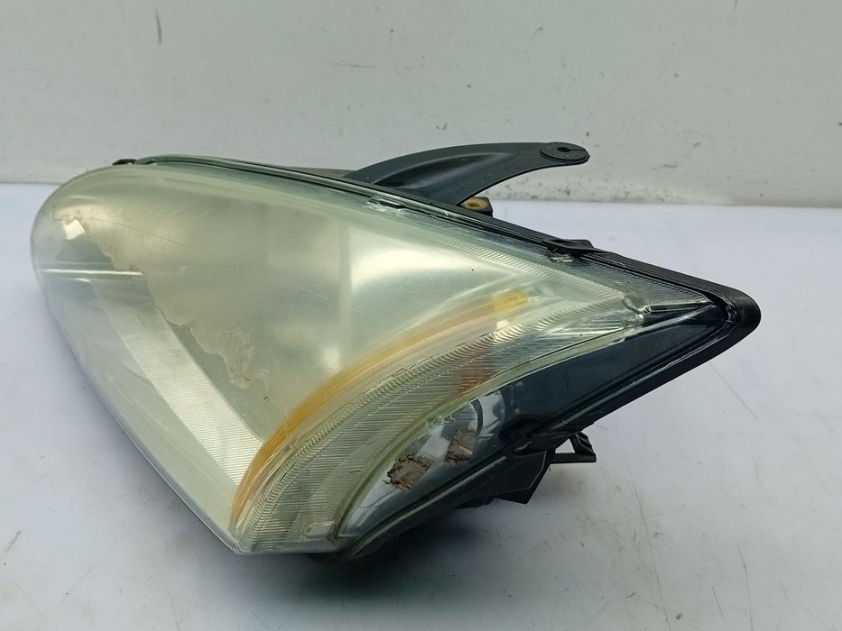 Ótica / farol esquerda FORD Focus II (DA_)