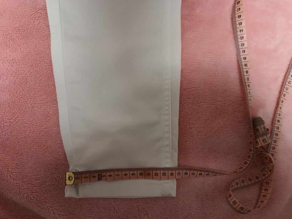 Białe spodnie 3/4 Clockhouse 40