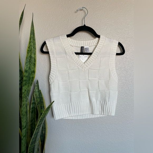 Тепла жіноча жилетка