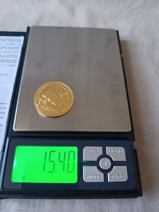 Золотая монета школьная