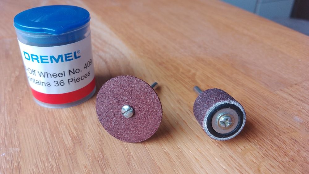 2 Trzpienie + tarcze Dremel 409 + rolka Dremel 432