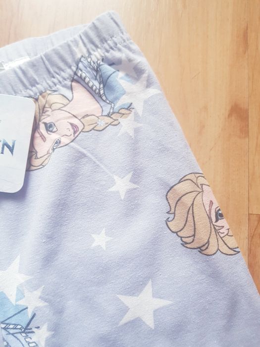 Nowe bawełniane legginsy dziewczęce marki Frozen rozmiar 134.