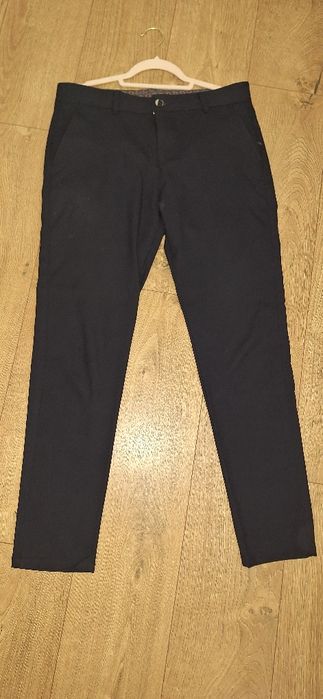Granatowe spodnie garniturowe 33 s m