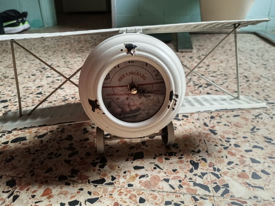 Relógio avião antigo,colecionador.