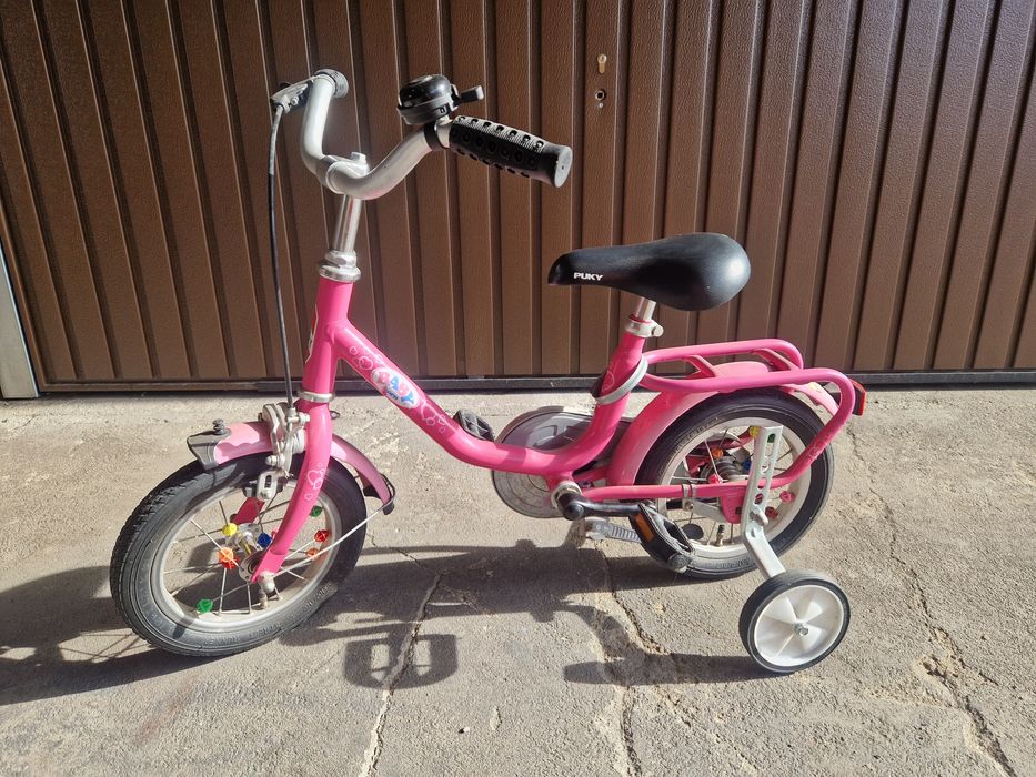 Sprzedam rowerek z bocznymi kółkami