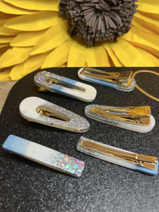 Заколки та шпильки для волосся