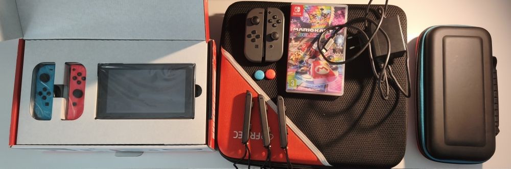 Nintendo Switch como nova + Mario Kart + 4 Joy-Con + acessórios + caixas