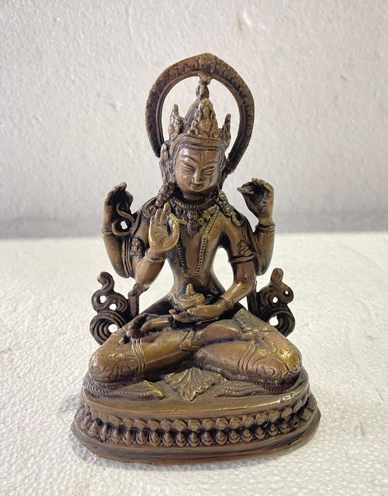 Escultura Oriental - Divindade budista