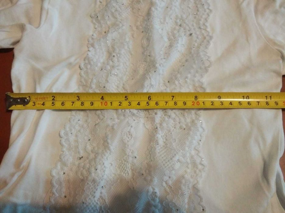 Білий гольф для дівчинки