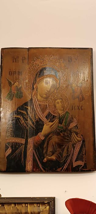 Ikona, obraz religijny Matki Boskiej Częstochowskiej wykonany na desce