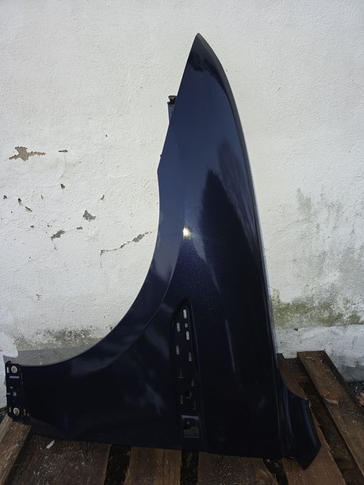 Blotnik Jaguar XF lewa strona orginalny
