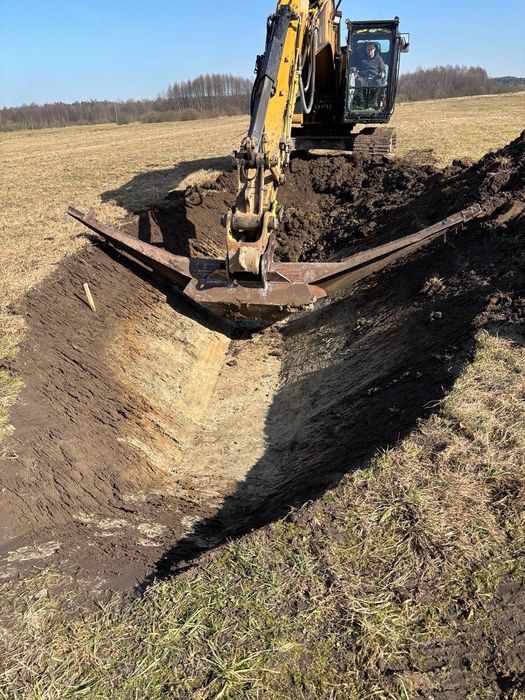 Usługi Transportowe Prace ziemne koparki , wywrotki , rozbiórki