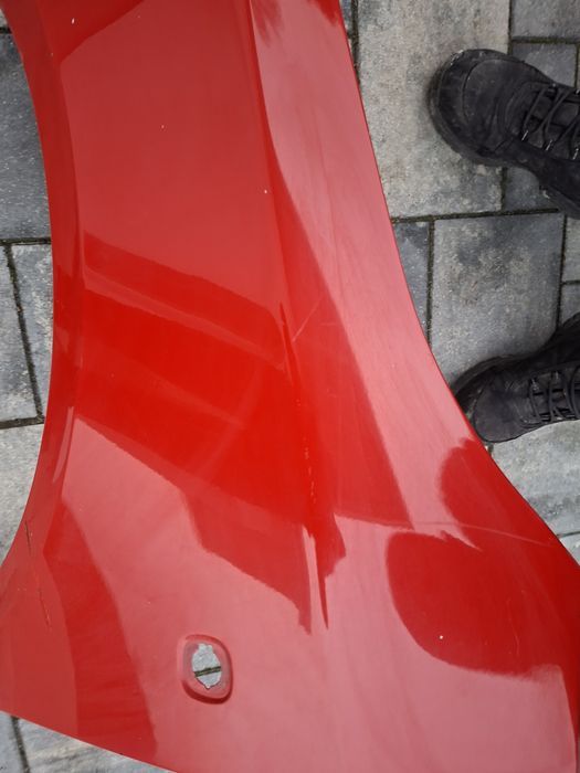 Skoda fabia 2 roomster blotnik przedni lewy czerwony lf3k