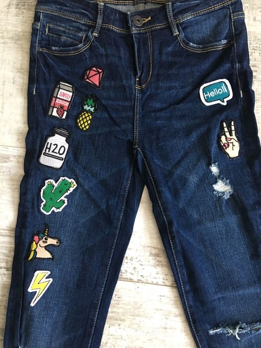 Nowe spodnie jeansowe z naszywkami Mohito xs 34