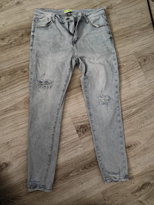 Spodnie jeans 44