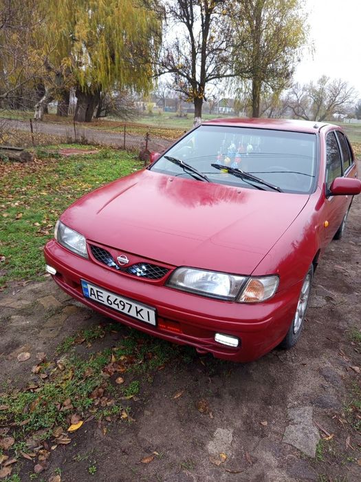 Nissan Almera 1.4 газ бензин
