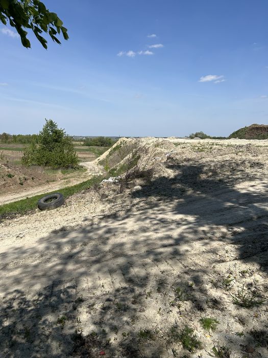 Вирівнювання ділянок підсипка засипка планування