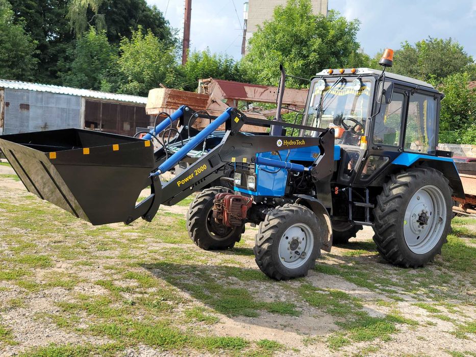 Быстросйомный фронтальный погрузчик кун Юмз