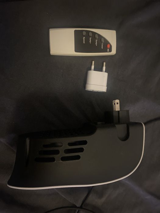 Aquecedor de tomada com comando