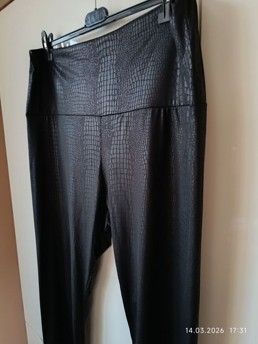 Czarne legginsy zwierzęcy wzór r 48 50