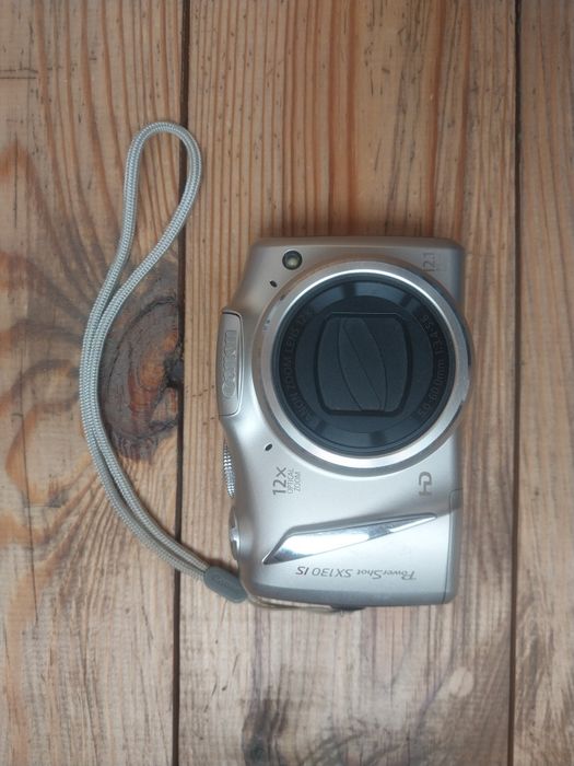 Цифровой фотоаппарат Canon Canon PowerShot SX130 IS        центр