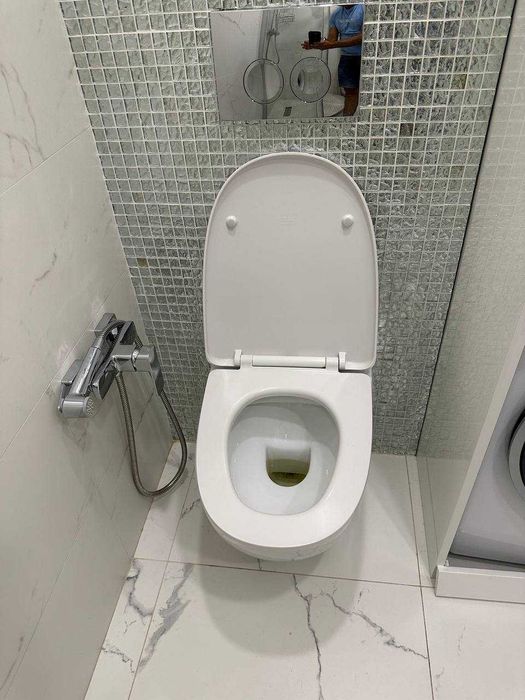 Унітаз підвісний RAK Ceramics Sensation SENWC1446AWHA з кришкою