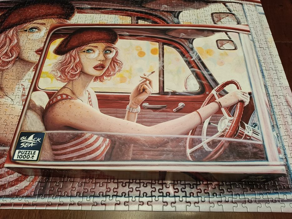 Puzzle 1000 Kobieta w aucie