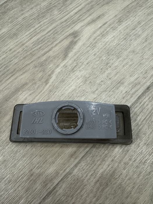 Плафон подсветки номера Kia Magentis