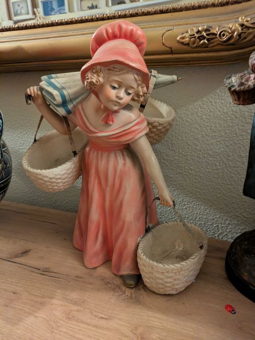 Boneca em cerâmica