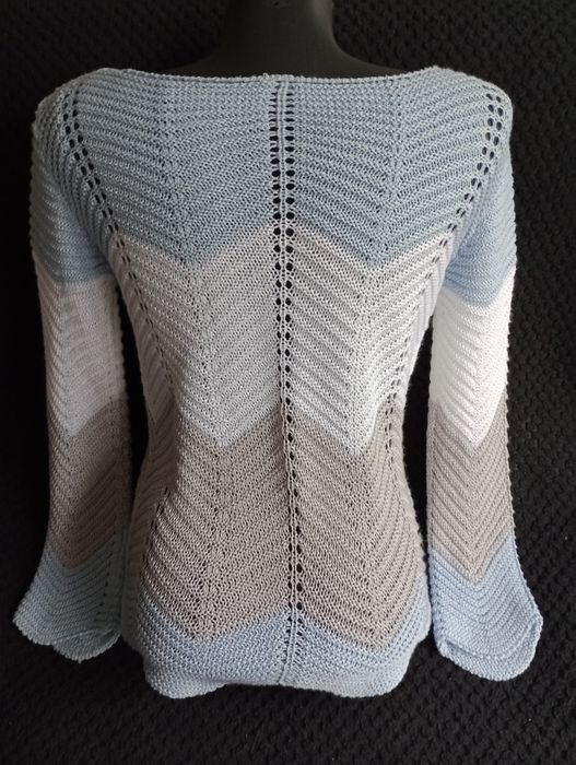 Uroczy sweterek ażurowy