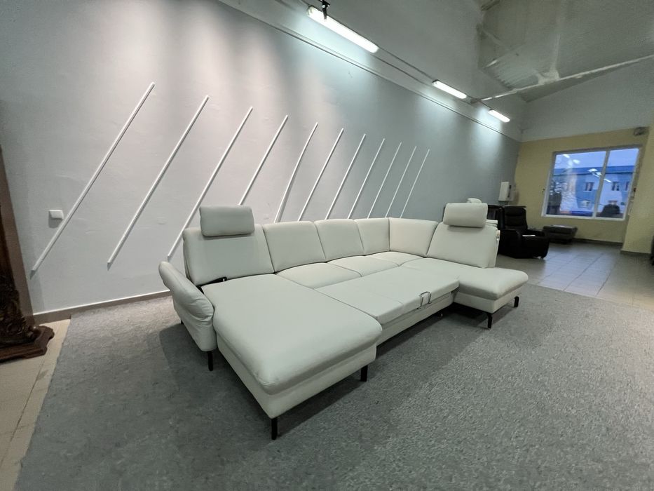 Виставковий новий шкіряний розкладний диван реклайнер