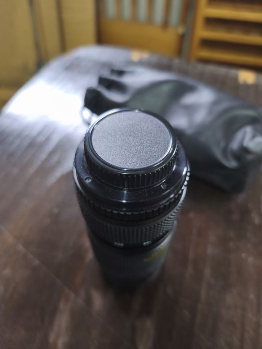 Objetiva máquina fotográfica