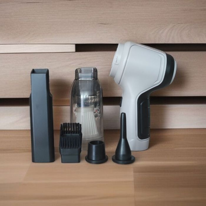 Przenośny mały odkurzacz USB do samochodu.