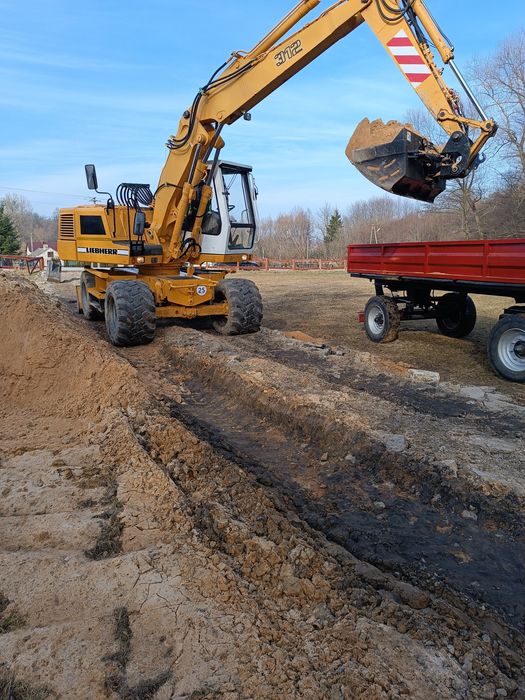 Usługi koparką kołową 14t, minikoparką 2.7t, transport wywrotką, rębak