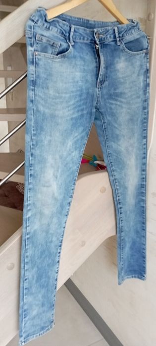 Jeansy Reporter young  stan bdb- rozmiar M joggery regulowany pas