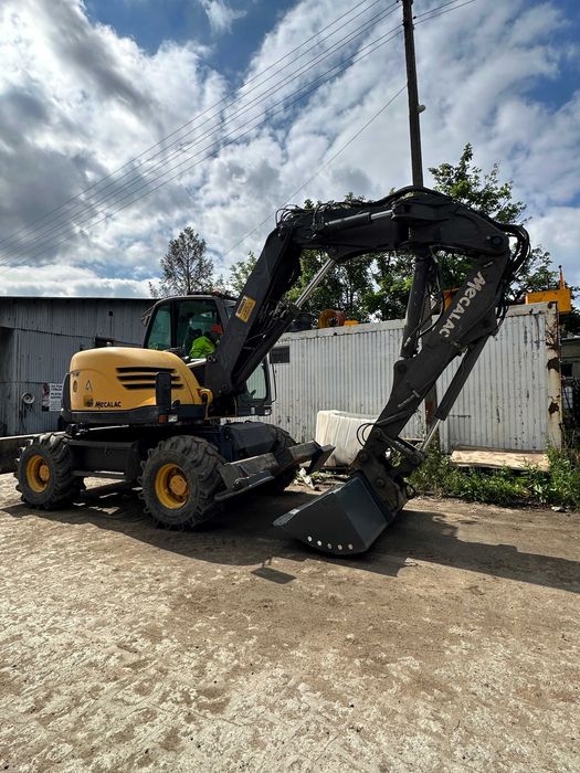Mecalac 714MW roboczogodziny od roboty koparka Wrocław z operatorem