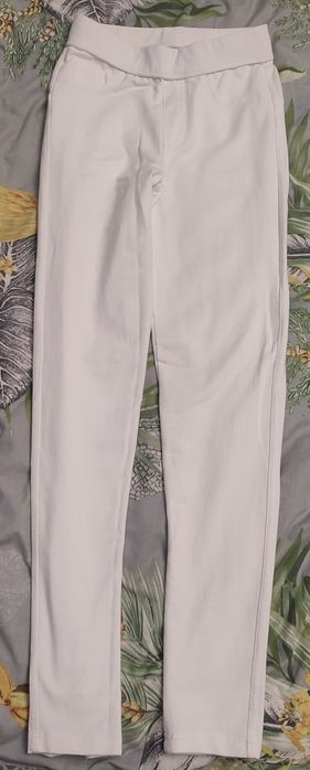 Білі штани жіночі