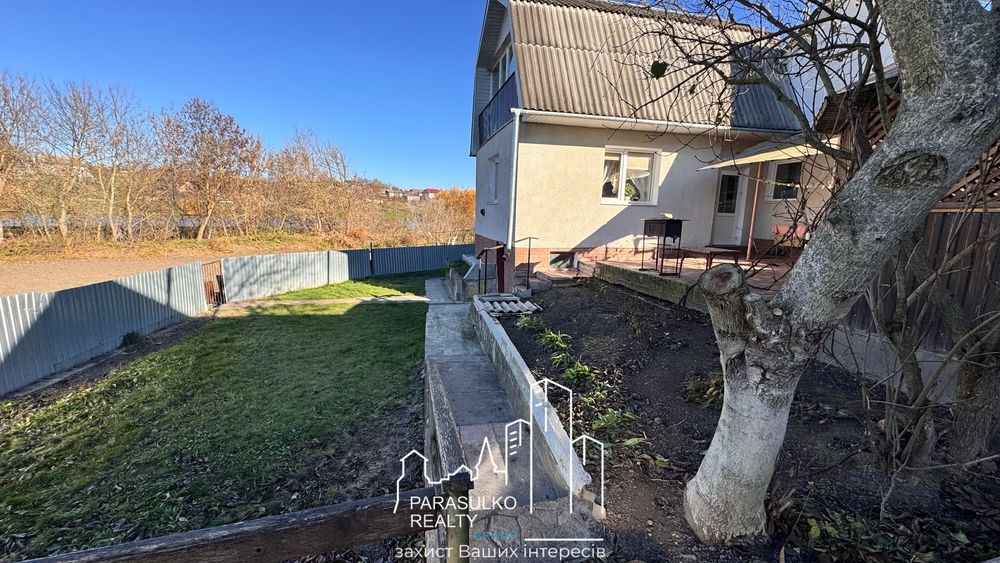 Продам будиночок поряд з ставочком