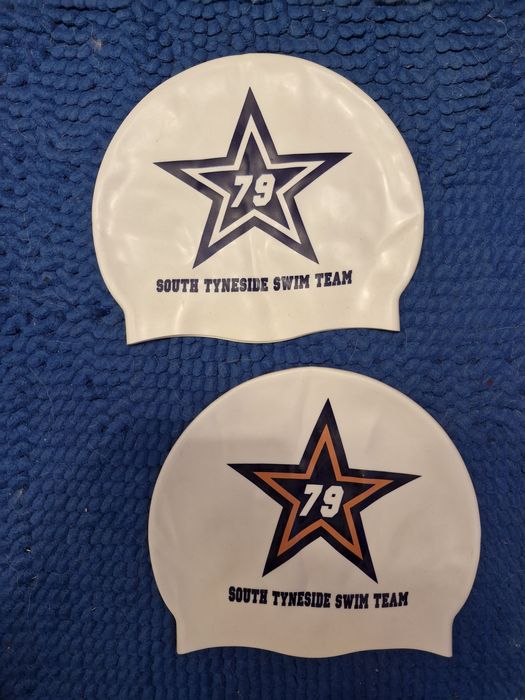 Шапочки для плавання