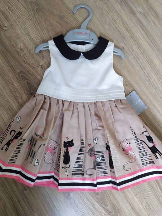 Nowa elegancka sukienka