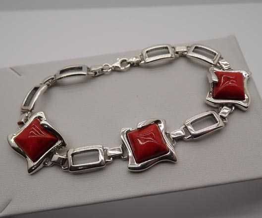 Srebrna bransoletka czerwone kamienie 20 cm.