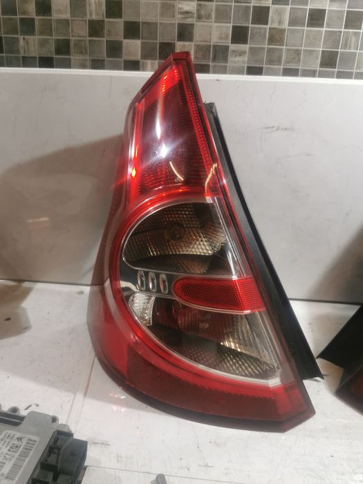 Stan BDB Lampa lewa lewy tył Dacia Sandro I Oryginał
