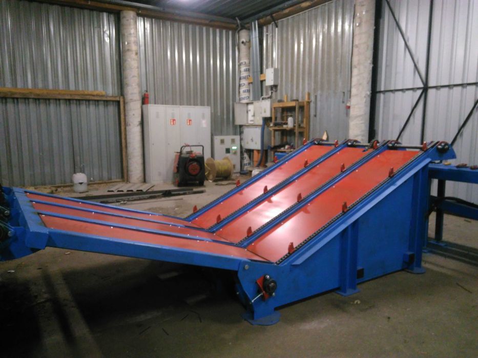 Podajnik skośny drewna