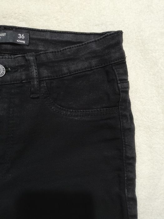 Czarne skinny jeansy spodnie ze średnim stanem