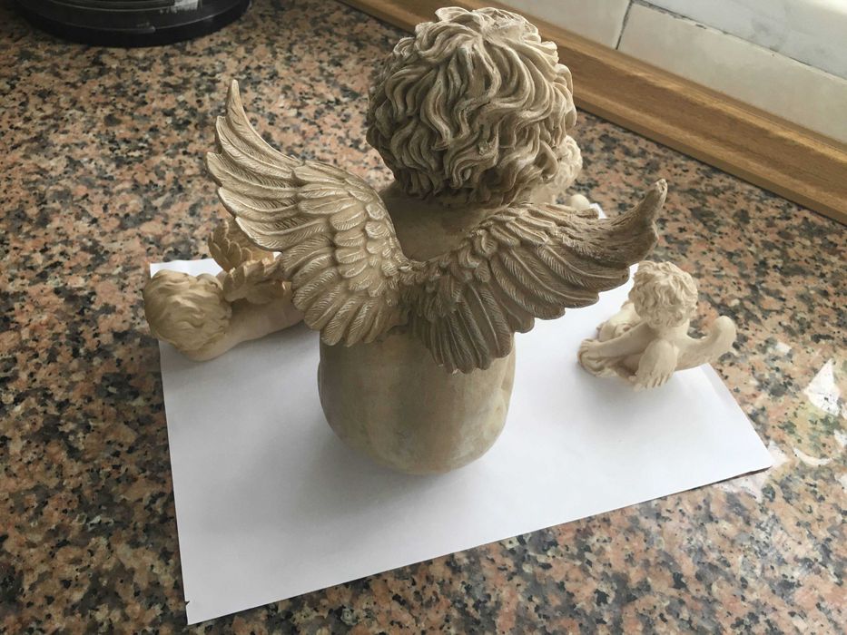 Anjos decorativos usados