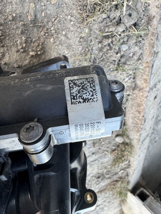 Помпа водяна (насос) охолодження, в зборі з корпусом 06L121111P VAG