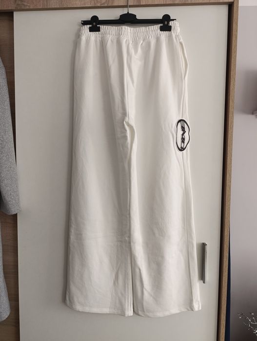 Reserved rozmiar 40 L białe spodnie dresowe z szerokimi nogawkami