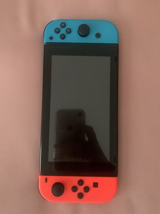 Nintendo Switch Vermelho/Azul Joy-Con c/Jogo Animal Crossing