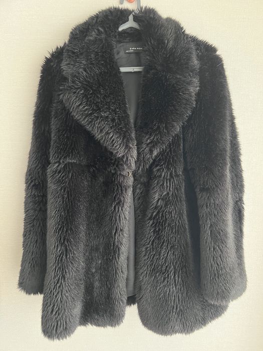 Casaco de pelo preto